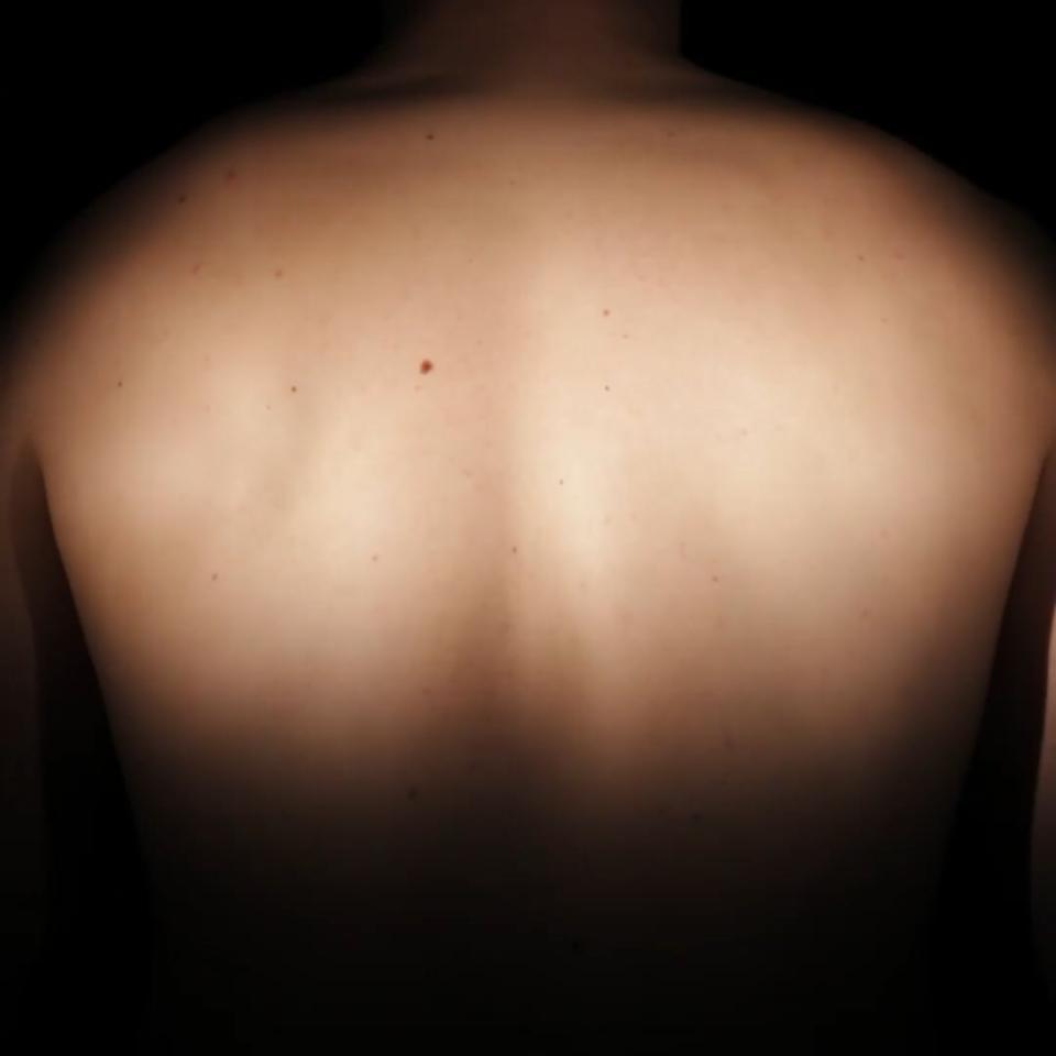 Back of the percussionist in quartet – bodies in performance